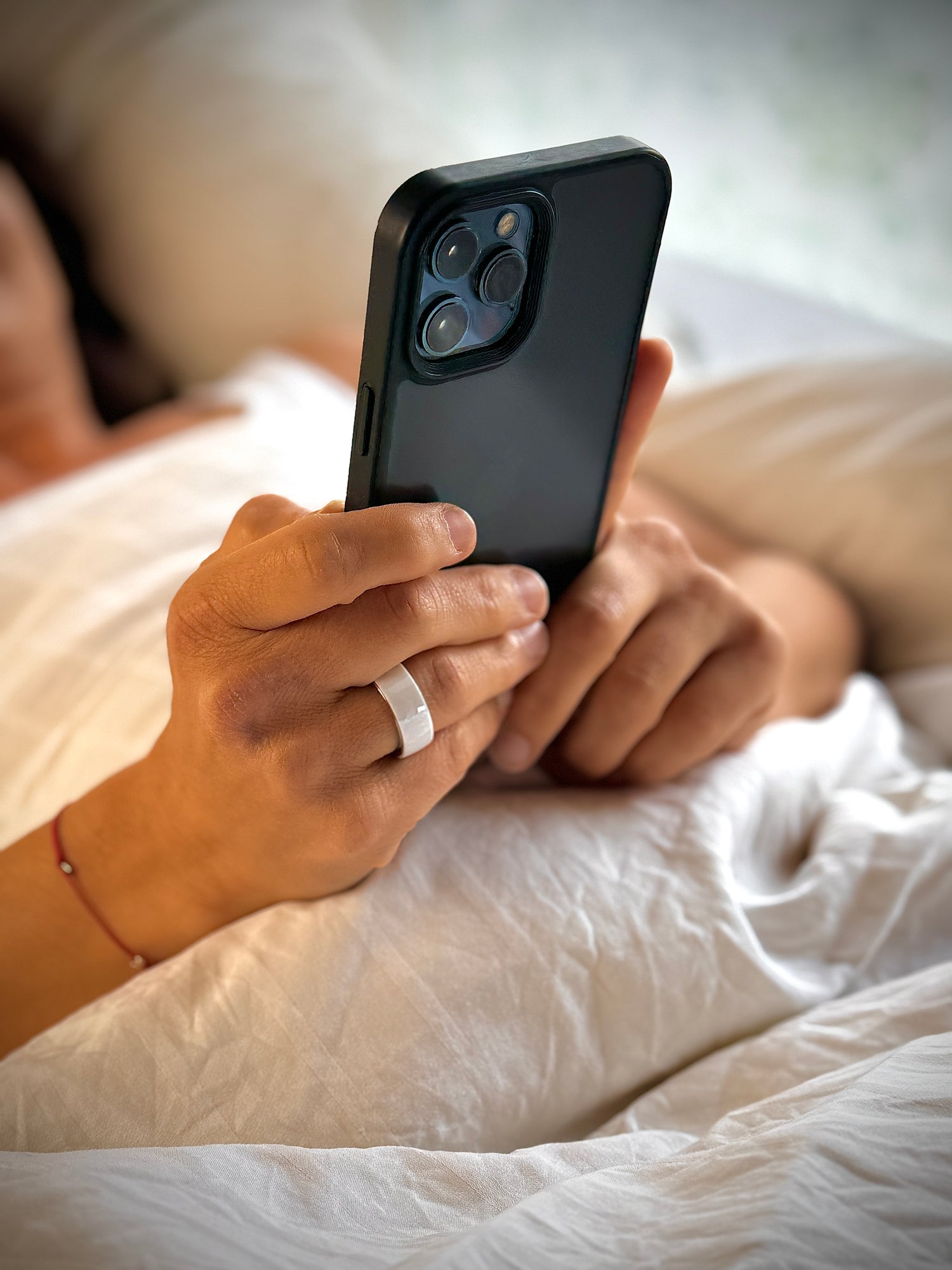 Woman lying comfortably in the Ergo bed
